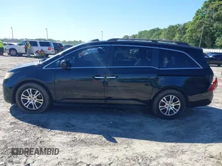2011 Honda Odyssey EX-L with VIN 5FNRL5H67BB087064, listed as a IAAI auction lot 42326427 with 177,795 mi miles and . Bid and sale history available at DreamBid. Image 14.