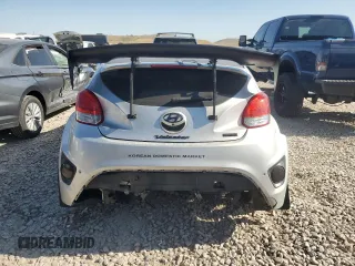 2015 Hyundai Veloster Turbo z VIN KMHTC6AE4FU221891, wystawiony jako Copart lot #58857565 z przebiegiem 144 671 mil mil oraz Szkoda całkowita • Salvage title. Historia ofert i sprzedaży dostępna na DreamBid. Obrazek 6.