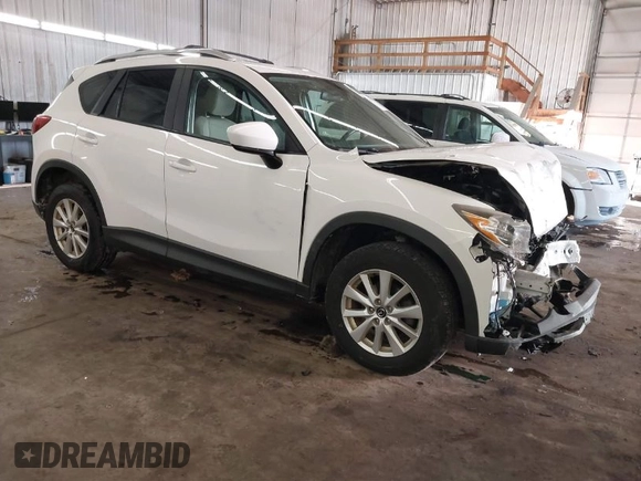 2014 Mazda CX-5 Touring with VIN JM3KE4CY4E0321055, listed as a IAAI auction lot 41613593 with 174,339 mi miles. Bid and sale history available at carsss.com. Image 1.