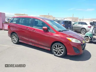 2012 Mazda 5 Touring with VIN JM1CW2CLXC0113181, listed as a IAAI auction lot 42653061 with 94,441 mi miles and . Bid and sale history available at DreamBid. Image 1.