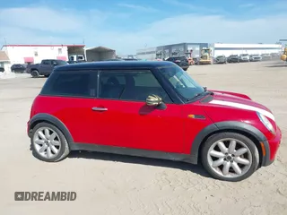 2006 MINI Hardtop with VIN WMWRC33506TK17012, listed as a IAAI auction lot 42076648 with 101,852 mi miles and . Bid and sale history available at DreamBid. Image 13.