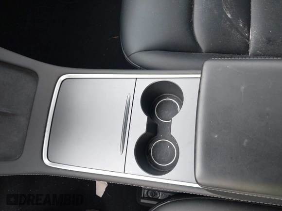 2023 Tesla Model Y Long Range with VIN 7SAYGDEE2PA044328, listed as a IAAI auction lot 42427625 with 41,324 mi miles and . Bid and sale history available at DreamBid. Image 18.