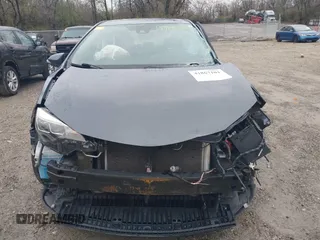 2019 Toyota Corolla L with VIN 5YFBURHE9KP898284, listed as a IAAI auction lot 41867103 with 75,368 mi miles and . Bid and sale history available at DreamBid. Image 13.