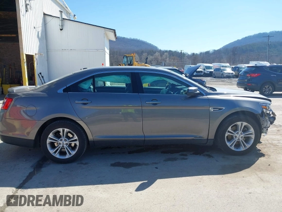 2014 Ford Taurus SEL with VIN 1FAHP2E82EG162676, listed as a IAAI auction lot 41795220 with 125,491 mi miles. Bid and sale history available at carsss.com. Image 14.