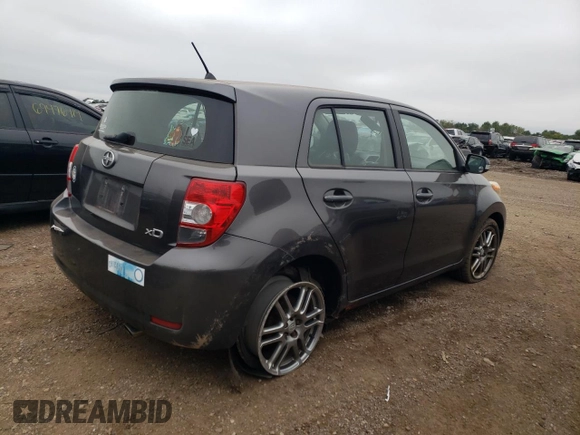 2009 Scion xD z VIN JTKKU10489J046486, wystawiony jako Copart lot #69332304 z przebiegiem 159 766 mil mil oraz Czysty tytuł • Clean title. Historia ofert i sprzedaży dostępna na DreamBid. Obrazek 3.
