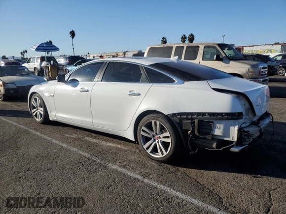 2014 Jaguar XJ with VIN SAJWA2GZ7E8V66626, listed as a Copart auction lot 78824254 with 132,720 mi miles and Salvage Title. Bid and sale history available at carsss.com. Image 2.