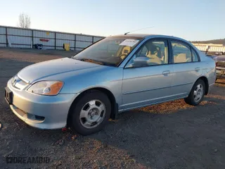 2003 Honda Civic Hybrid with VIN JHMES95683S010347, listed as a IAAI auction lot 41458780 with 180,952 mi miles. Bid and sale history available at carsss.com. Image 2.
