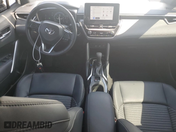 2023 Toyota Corolla Cross Hybrid S with VIN 7MUFBABG5PV008595, listed as a Copart auction lot 60002585 with 9,052 mi miles and Salvage title. Bid and sale history available at DreamBid. Image 8.