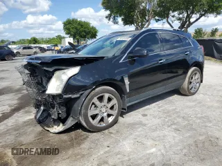2012 Cadillac SRX Performance Collection z VIN 3GYFNBE3XCS576065, wystawiony jako Copart lot #55103085 z przebiegiem 155 586 mil mil oraz Szkoda całkowita • Salvage title. Historia ofert i sprzedaży dostępna na DreamBid. Obrazek 1.