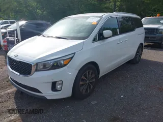 2016 Kia Sedona SX with VIN KNDMC5C12G6141461, listed as a IAAI auction lot 42200862 with 183,859 mi miles and . Bid and sale history available at carsss.com. Image 2.