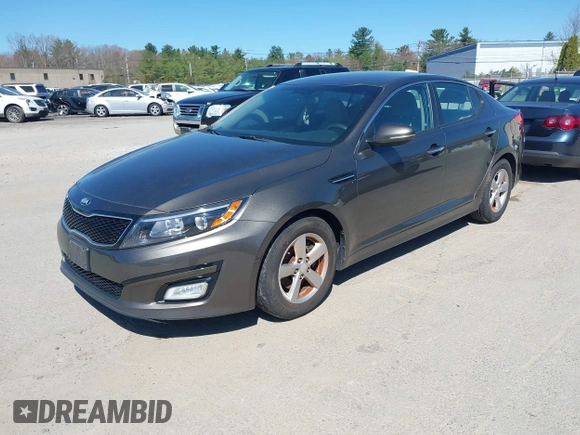 2015 Kia Optima LX with VIN 5XXGM4A74FG396236, listed as a IAAI auction lot 42165862 with 127,383 mi miles. Bid and sale history available at carsss.com. Image 2.