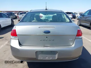 2008 Ford Focus SE with VIN 1FAHP35N68W154490, listed as a IAAI auction lot 42128643 with 141,316 mi miles. Bid and sale history available at carsss.com. Image 16.