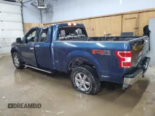 2018 Ford F-150 XL with VIN 1FTFX1E57JFE75983, listed as a Copart auction lot 52619685 with 184,124 mi miles and Clean title. Bid and sale history available at DreamBid. Image 2.