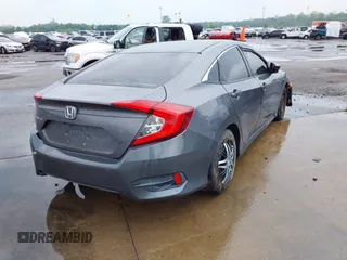 2019 Honda Civic Sedan LX with VIN 2HGFC2F60KH537797, listed as a IAAI auction lot 42119603 with 1 mi miles. Bid and sale history available at carsss.com. Image 4.