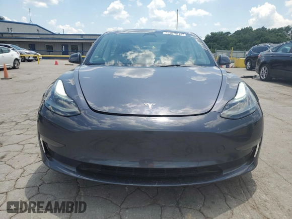 2023 Tesla Model 3 with VIN 5YJ3E1EA7PF576007, listed as a Copart auction lot 61674915 with 15,956 mi miles and Salvage title. Bid and sale history available at DreamBid. Image 5.