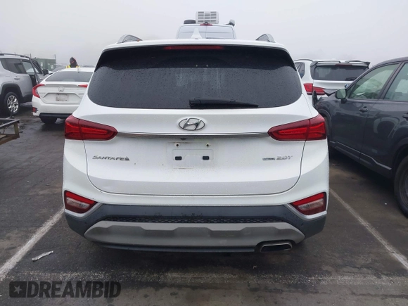 2019 Hyundai Santa Fe Ultimate with VIN 5NMS5CAA3KH036089, listed as a IAAI auction lot 40810710 with 62,561 mi miles and . Bid and sale history available at DreamBid. Image 16.