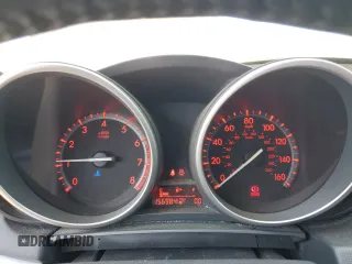2011 Mazda 3 S Sport z VIN JM1BL1K59B1376286, wystawiony jako Copart lot #59350725 z przebiegiem 156 984 mil mil oraz Czysty tytuł • Clean title. Historia ofert i sprzedaży dostępna na DreamBid. Obrazek 9.