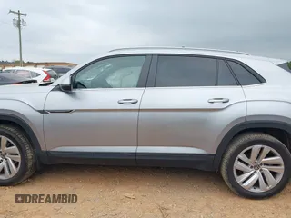 2020 Volkswagen Atlas SE z VIN 1V26C2CA5LC206661, wystawiony jako IAAI lot #41945822 z przebiegiem 43 297 mil mil oraz . Historia ofert i sprzedaży dostępna na DreamBid. Obrazek 14.