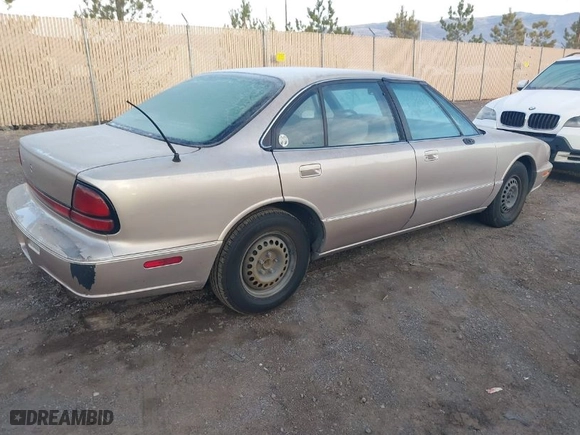 1999 Oldsmobile 88 LS with VIN 1G3HN52K9X4823934, listed as a IAAI auction lot 41122946 with NaN miles. Bid and sale history available at carsss.com. Image 4.