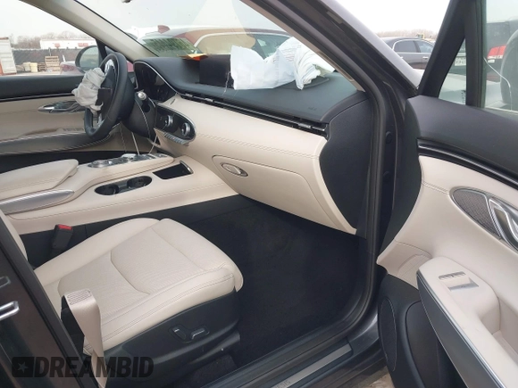 2022 Genesis GV70 2.5T with VIN KMUMADTB2NU065058, listed as a IAAI auction lot 41707351 with 77,831 mi miles and . Bid and sale history available at DreamBid. Image 5.