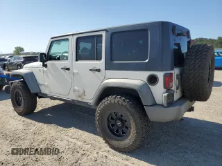 2009 Jeep Wrangler Unlimited Rubicon with VIN 1J8GA69149L767218, listed as a Copart auction lot 59342825 with 157,307 mi miles and Salvage title. Bid and sale history available at DreamBid. Image 2.