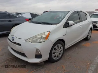 2013 Toyota Prius One z VIN JTDKDTB34D1039552, wystawiony jako IAAI lot #41993490 z przebiegiem 133 728 mil mil oraz . Historia ofert i sprzedaży dostępna na DreamBid. Obrazek 2.