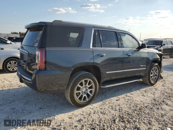 2019 GMC Yukon Denali with VIN 1GKS1CKJ9KR134571, listed as a Copart auction lot 73275664 with 50,853 mi miles and Salvage Title. Bid and sale history available at carsss.com. Image 3.