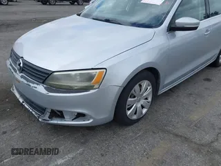 2013 Volkswagen Jetta Sedan SE with VIN 3VWDP7AJ5DM292211, listed as a IAAI auction lot 42129945 with 103,705 mi miles. Bid and sale history available at carsss.com. Image 14.