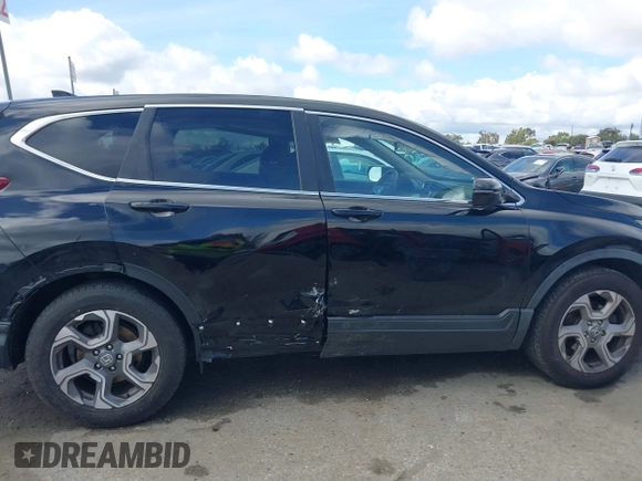 2017 Honda CR-V EX with VIN 7FARW1H55HE009693, listed as a IAAI auction lot 41539260 with 136,645 mi miles. Bid and sale history available at carsss.com. Image 13.