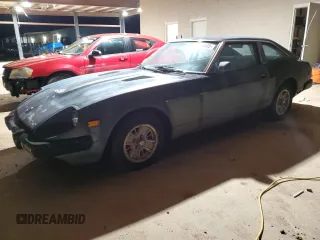 1979 Datsun 280ZX z VIN HGS130119790, wystawiony jako Copart lot #41504935 z przebiegiem 36 796 mil mil oraz Tytuł czysty. Historia ofert i sprzedaży dostępna na DreamBid. Obrazek 1.