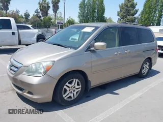 2005 Honda Odyssey EX-L with VIN 5FNRL38705B087733, listed as a IAAI auction lot 42165084 with 254,357 mi miles. Bid and sale history available at carsss.com. Image 2.