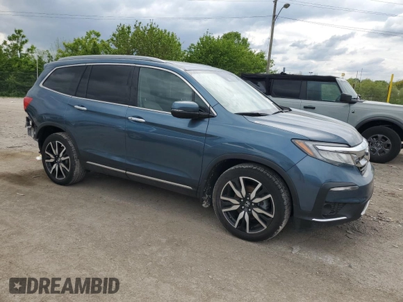 2020 Honda Pilot Touring 7-Passenger with VIN 5FNYF6H64LB022022, listed as a Copart auction lot 56210385 with Not provided miles and Salvage title. Bid and sale history available at DreamBid. Image 4.