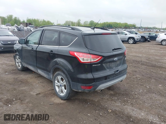 2015 Ford Escape SE with VIN 1FMCU9GX5FUB99018, listed as a IAAI auction lot 42250840 with 126,850 mi miles and . Bid and sale history available at DreamBid. Image 3.