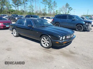 2000 Jaguar XJ with VIN SAJDA15B2YMF14634, listed as a IAAI auction lot 41827953 with 111,505 mi miles and . Bid and sale history available at DreamBid. Image 1.