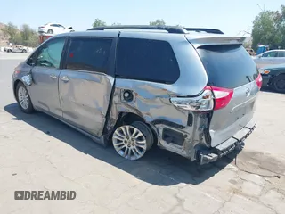 2015 Toyota Sienna XLE with VIN 5TDYK3DC0FS589947, listed as a IAAI auction lot 36567379 with 130,969 mi miles and . Bid and sale history available at DreamBid. Image 3.