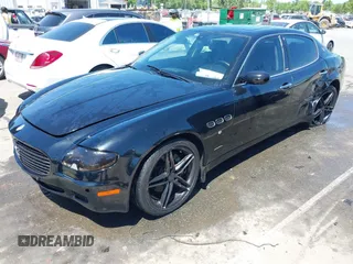 2006 Maserati Quattroporte z VIN ZAMCE39A660024352, wystawiony jako IAAI lot #42050460 z przebiegiem 57 715 mil mil oraz . Historia ofert i sprzedaży dostępna na DreamBid. Obrazek 2.