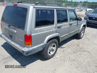 2000 Jeep Cherokee with VIN 1J4FT48SXYL236142, listed as a IAAI auction lot 42598342 with 153,426 mi miles and . Bid and sale history available at DreamBid. Image 4.