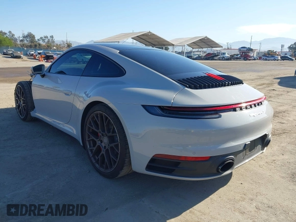 2020 Porsche 911 Carrera S with VIN WP0AB2A90LS226443, listed as a IAAI auction lot 42019338 with 19,734 mi miles and . Bid and sale history available at DreamBid. Image 3.