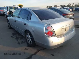 2002 Nissan Altima S with VIN 1N4AL11D72C174190, listed as a IAAI auction lot 41390812 with 171,646 mi miles. Bid and sale history available at carsss.com. Image 3.