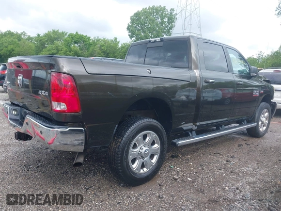 2014 Ram 2500 Big Horn with VIN 3C6UR5DJ4EG189320, listed as a IAAI auction lot 42287502 with 163,728 mi miles and . Bid and sale history available at DreamBid. Image 4.