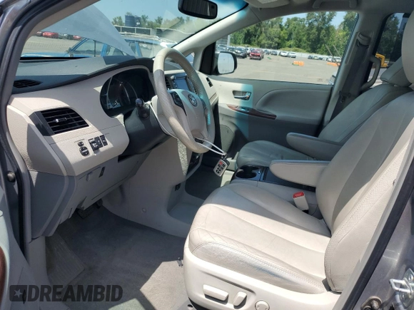 2012 Toyota Sienna XLE AAS with VIN 5TDYK3DC0CS194193, listed as a Copart auction lot 60265455 with 139,246 mi miles and Salvage title. Bid and sale history available at DreamBid. Image 7.