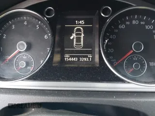 2013 Volkswagen CC Lux with VIN WVWRP7AN7DE510490, listed as a IAAI auction lot 41457328 with 154,443 mi miles. Bid and sale history available at carsss.com. Image 7.
