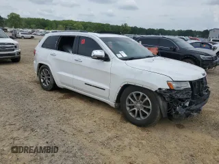 2014 Jeep Grand Cherokee Overland with VIN 1C4RJFCT2EC293743, listed as a Copart auction lot 54221695 with 169,312 mi miles and Clean Title. Bid and sale history available at DreamBid. Image 4.