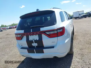 2023 Dodge Durango R/T Plus with VIN 1C4SDJCTXPC553725, listed as a IAAI auction lot 42290693 with 74,995 mi miles and . Bid and sale history available at DreamBid. Image 16.