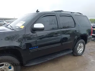 2009 Chevrolet Tahoe 2LT z VIN 1GNFK23009R296956, wystawiony jako IAAI lot #42143854 z przebiegiem 162 156 mil mil oraz . Historia ofert i sprzedaży dostępna na DreamBid. Obrazek 14.