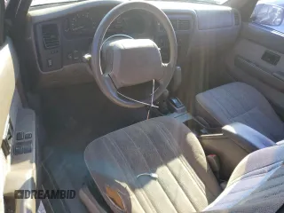 1998 Toyota Tacoma with VIN 4TAWN72N6WZ106014, listed as a Copart auction lot 87767435 with 167,626 mi miles and Salvage Title. Bid and sale history available at DreamBid. Image 8.