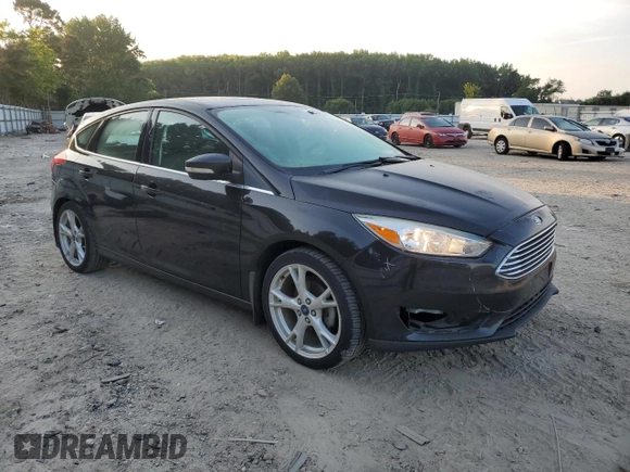 2015 Ford Focus Titanium with VIN 1FADP3N23FL346078, listed as a Copart auction lot 61991195 with 188,014 mi miles and Salvage title. Bid and sale history available at DreamBid. Image 4.