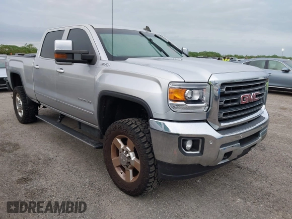2016 GMC Sierra 2500HD SLT z VIN 1GT12TE89GF183548, wystawiony jako IAAI lot #40476400 z przebiegiem 203 148 mil mil oraz . Historia ofert i sprzedaży dostępna na DreamBid. Obrazek 1.