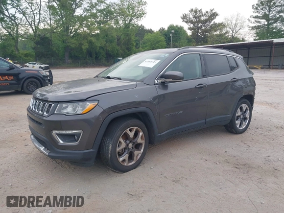 2020 Jeep Compass Limited with VIN 3C4NJCCB0LT128635, listed as a IAAI auction lot 42085121 with 166,511 mi miles and . Bid and sale history available at DreamBid. Image 2.