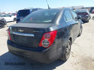 2014 Chevrolet Sonic LT with VIN 1G1JC5SH1E4243143, listed as a IAAI auction lot 41841260 with 170,514 mi miles and . Bid and sale history available at DreamBid. Image 4.
